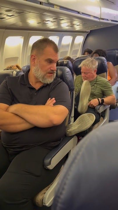 KICKING SEATS ON A FLIGHT. NOT COOL!