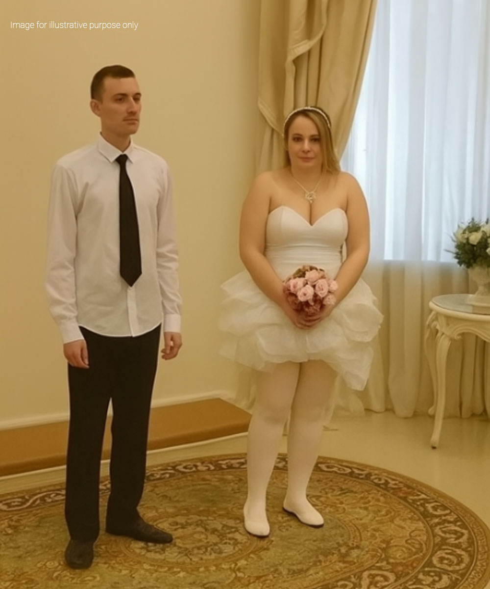 As the certificate was being signed, something moved under the bride’s dress! The groom paled, and all the guests whistled…